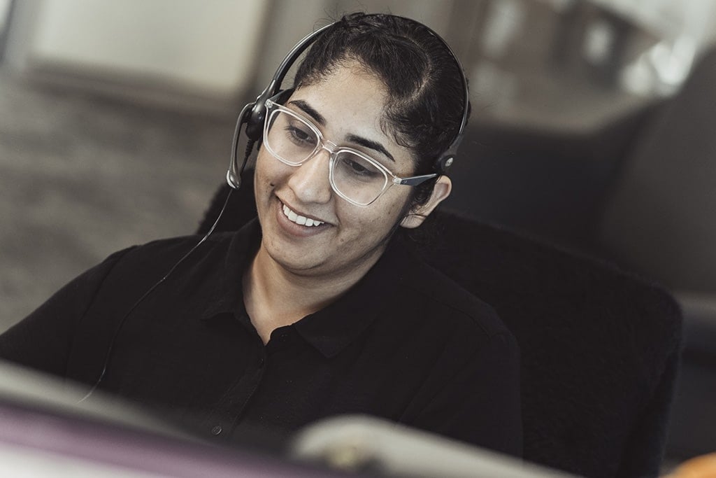 Austin Technology service desk engineer on a support call in the Subiaco office