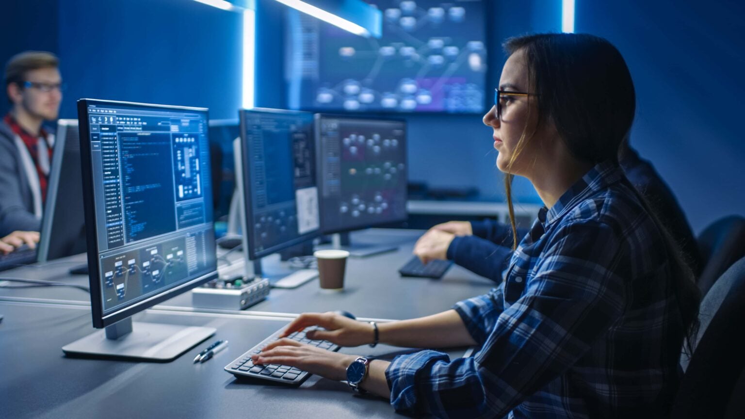 An engineer reviewing security results on screen