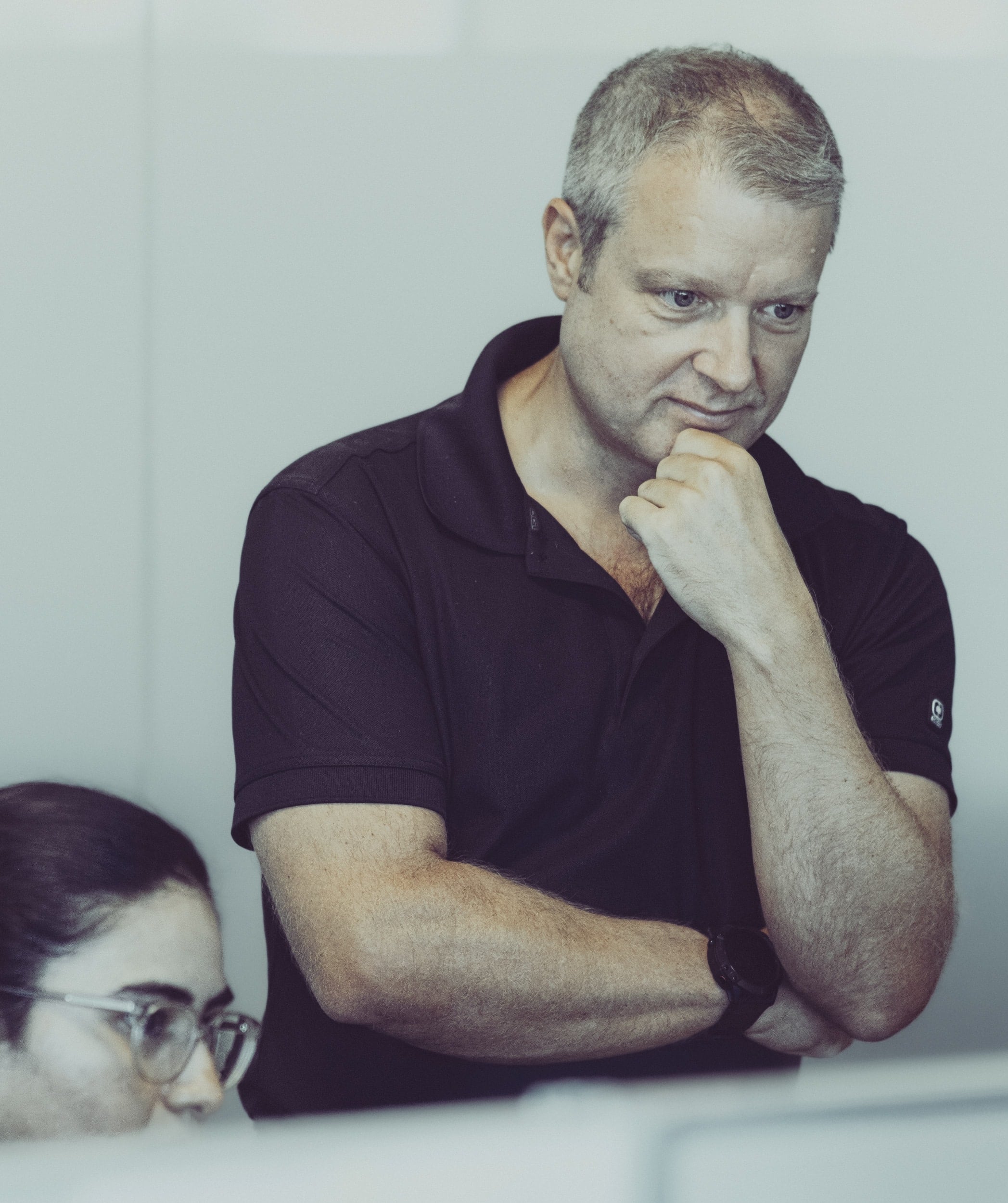 Austin Technology engineer reviewing a client's security setup with a colleague