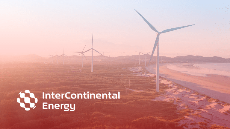 Wind turbines on a coastline with the InterContinental Energy logo