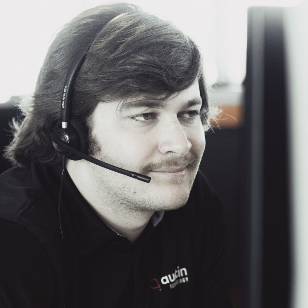 An Austin Technology service desk engineer on a support call