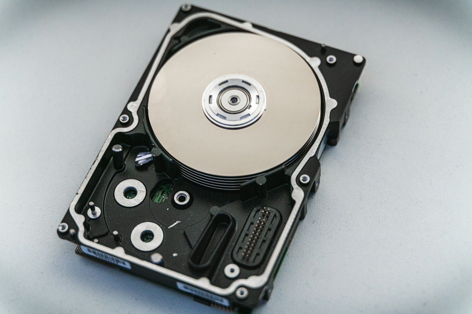 Open hard disk drive showing the platter