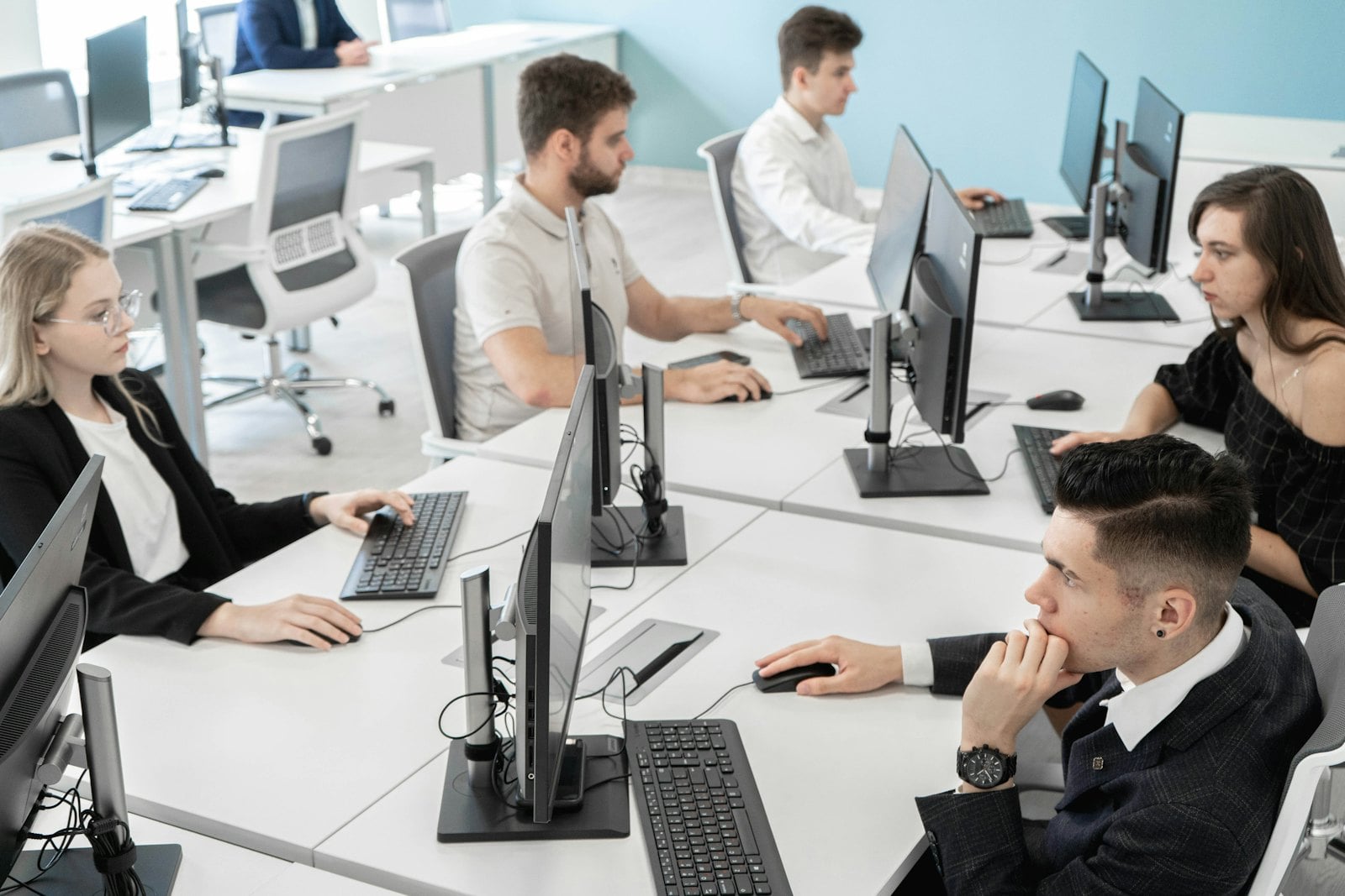 Team working at computers in an open plan office
