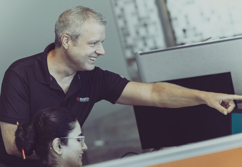 An Austin Technology solutions architect talking a colleague through a fix