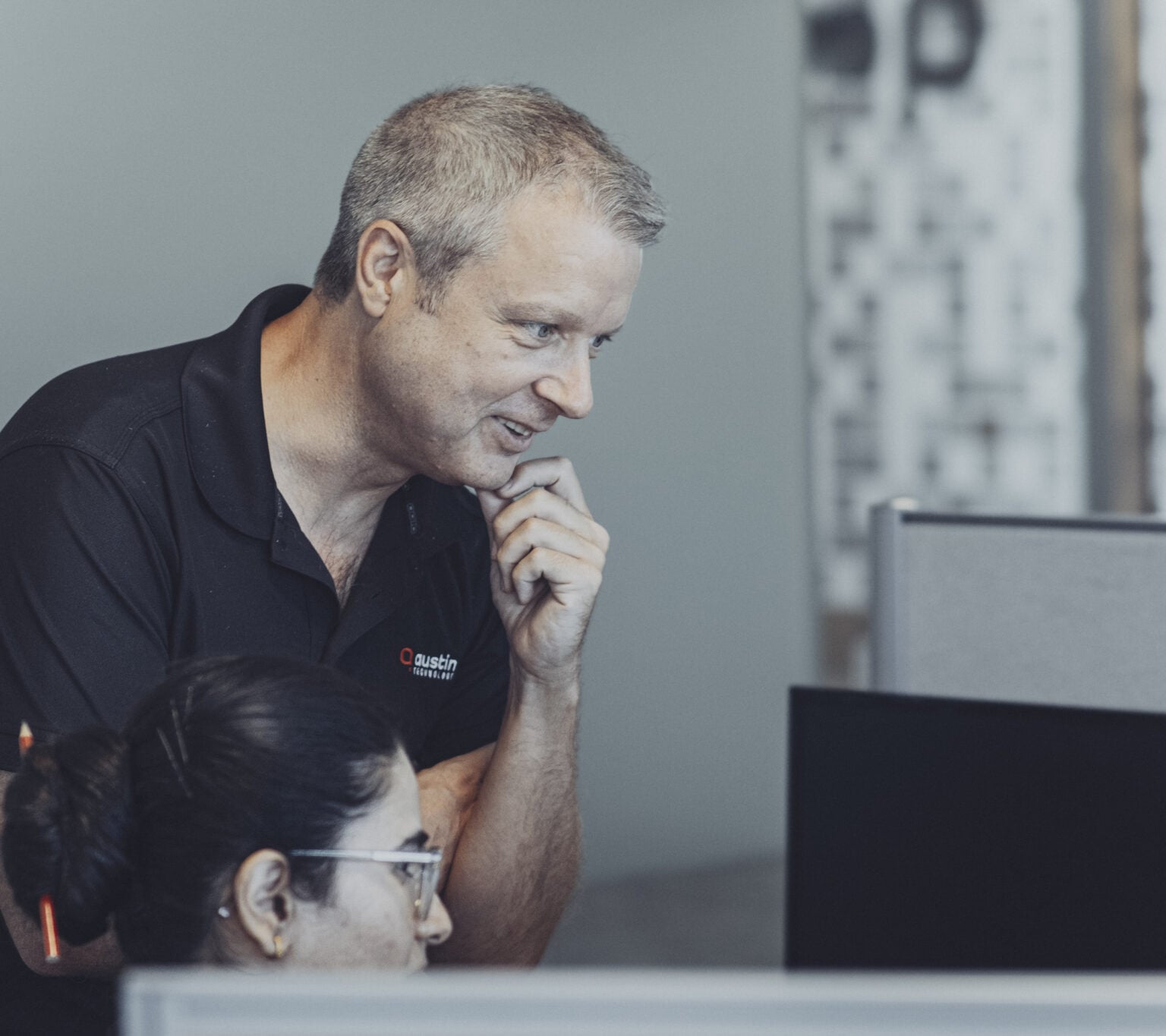 An Austin Technology engineer checking backup results at his desk