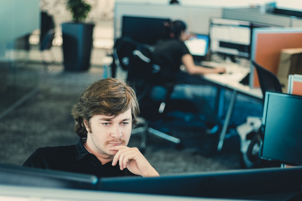 An Austin Technology service desk engineer at his desk
