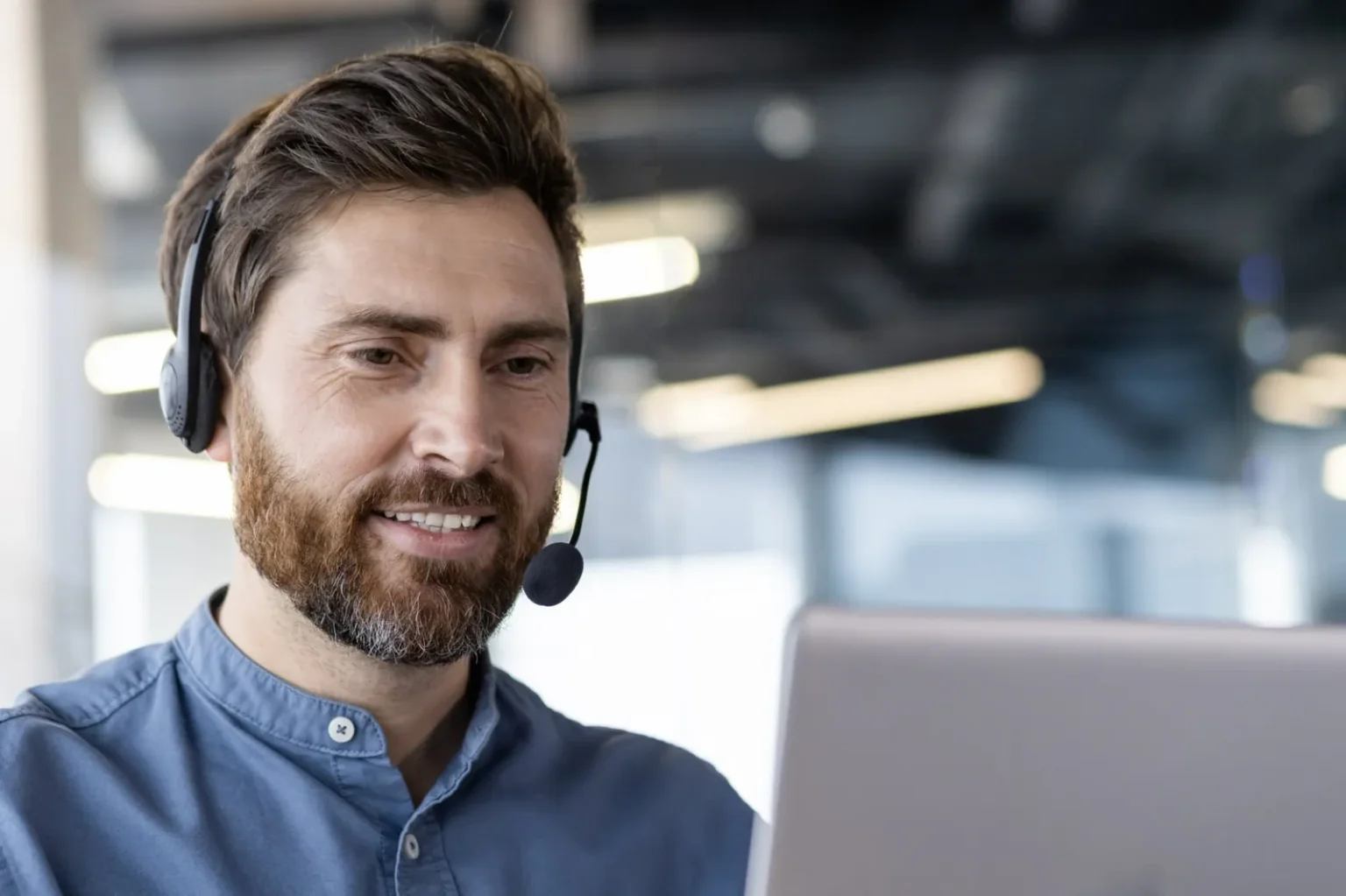 An Austin Technology engineer on a support call at the service desk